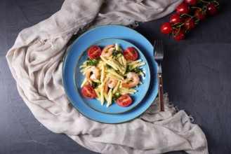 Strozzapreti pasta with spinach and prawns