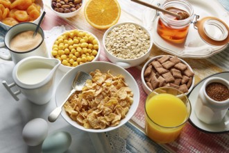 Breakfast healthy cereal coffee and orange juice and eggs