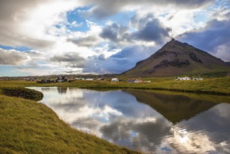 Sunset in the fishing village of Arnastapi. Evening in the Arctic