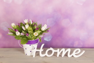 Colorful tulips in vase in interior