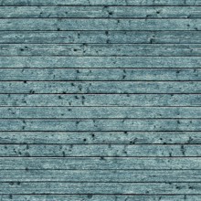 Turquoise painted wooden planks showing knots and grain creating a rustic texture background, ideal
