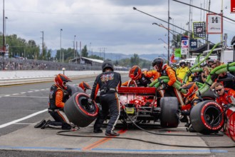 INDYCAR Series driver, BENJAMIN PEDERSEN (R) (55) of Copenhagen, Denmark, brings his car in for