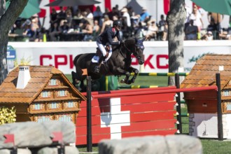 Ben Maher of Great Britain, riding Exit Remo competes in the BMO Nations Cup during the CSIO Spruce
