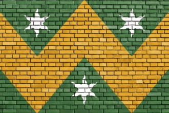 Flag of Wadhurst painted on brick wall