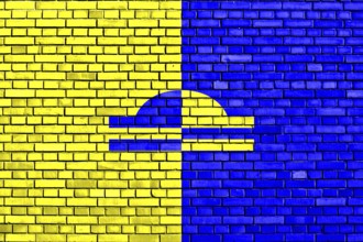 Flag of Ede painted on brick wall