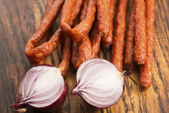Snack stick sausage with onion