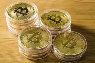 Bitcoins on a light background
