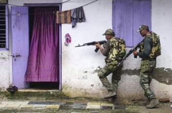 Force One commandos conduct a search and combing operation in a slum area of Uran, about 47 km East
