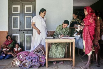 Gandhian women NGO social worker helping to tribal women, Gujarat, India, Asia
