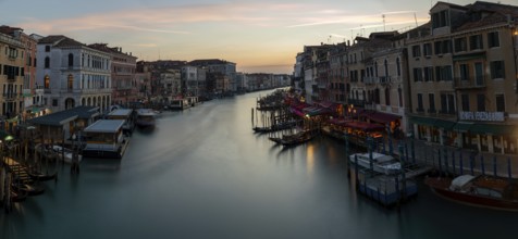Evening light at sunset, view over the Grand Canal, from the Rialto Bridge, long exposure,