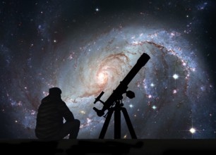 Man with telescope looking at the stars. Stellar Nursery NGC 1672. Spiral galaxy in the