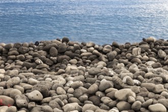 Volcanic rock beach and sea- ideal for backgrounds