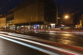 Prague, Czech Republic, 08 01 2020 Traffic light trails by night at the Prague National Theater,