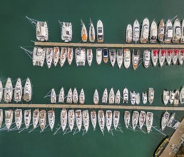 Aerial top view on the luxury yachts and boats in marina
