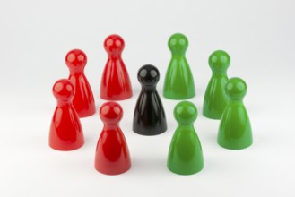 Conceptual game pawns that depict the concept different