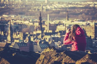 Young Woman Tourist Photographer In Edinburgh Scotland At Sunset