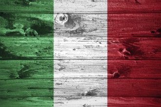 Italy flag on wooden planks background wood flag