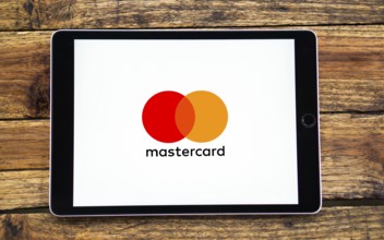 Smart phone with the Mastercard logo that is a brand of credit and debit cards