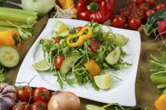Healthy eating background. Different vegetables and salad with leaf vegetables and cherry tomatoes