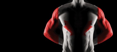 Canada flag on muscled male torso with abs, black background
