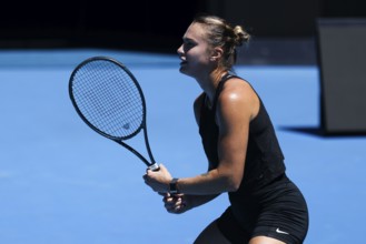 MELBOURNE, AUSTRALIA, JANUARY 12: Aryna Sabalenka of Belarus practices with Paula Badosa of Spain
