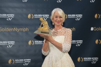 Dame Helen Mirren with her Crystal Nymph award for her lifetime achievement, Nymphes d'Or award