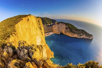 The coast of the Greek island of Zakynthos. Famous Shipwreck Beach. Romantic fabulous sunset. The