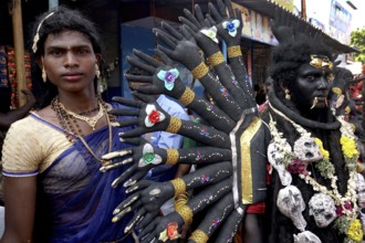 People dress as Hindu Goddess Kali near Mutharamman temple, Tamil Nadu, India, Asia