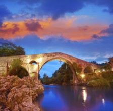 Cangas de Onis roman bridge on Sella river in Asturias of Spain