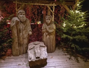 Traditional Christmas nativity scene with figures made out of wood, the birth of Jesus Christ in