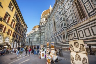 Florence Tuscany Italy on September 30, 2019 Artists exhibit paintings in front of the Duomo in