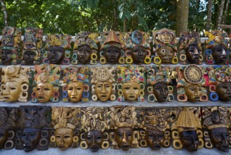 Chichen itza Mayan handcrafted wooden masks in Yucatan Mexico