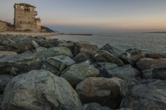 View over the sea into the sunset. Landscape taken with the historical landmark of the Byzantine