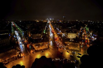 View from Arc de triomphe at night, Photo image a Beautiful panoramic view of Paris Metropolitan