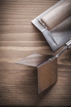Vertical version copyspace two angle formers on wood board