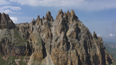 Aerial view on Naujiza or Mother-in-law teeth mountain with fantastic cliffs in Kabardino-Balkaria,