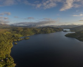 A view of Lough Caragh lake in the Glencar Valley of Kerry County in warm eveing light