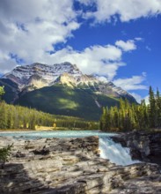 The magnificent powerful Athabasca Falls, popular with tourists. Rocky Mountains of Canada. The