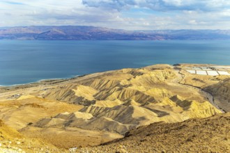Israel. The great wonder of nature is the Dead Sea. Cloudy and clear January day. The sea surface