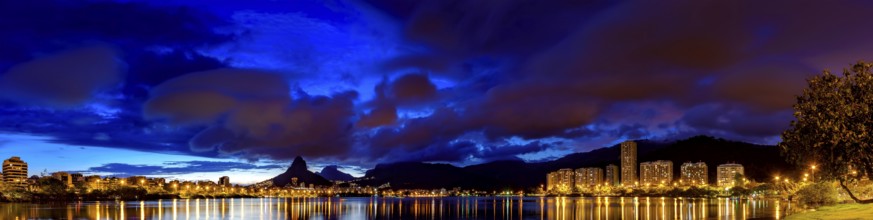 Panoramic image of the first summer night of the year 2018 seen from the lagoon Rodrigo de Freitas