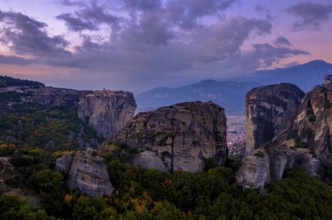 Hilltop monastery of the Holy Trinity at dawn, rocks of Meteora, Trikala, Thessaly, Greece, Europe