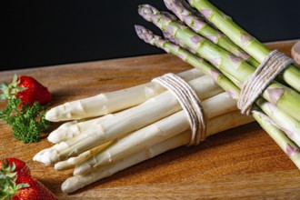 Green and white asparagus on the table