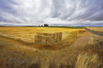 The big haystack on an autumn floor after harvesting. Other photos of autumn fields of Montana can