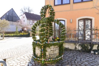 Easter fountain in Niederlommatzsch, Diera-Zehren, Saxony, Germany, Europe