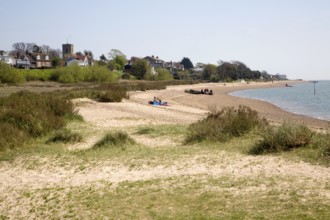 Sandy beach and village of West Mersea, Mersea Island, Essex, England, United Kingdom, Europe