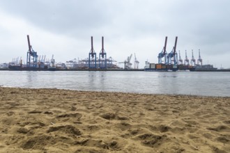 Hamburg with Elbe, beach harbour cranes, industry, loading, trade, customs, maritime trade,