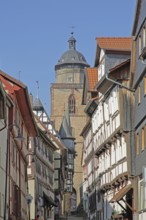 Half-timbered houses and tower of the Walpurgis church, church tower, Obere Fuldauer Gasse, spire,