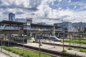 The railway tracks and arriving trains at Freiburg main station seen from the west, Freiburg im