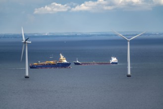 Wind turbines, offshore wind farm east of Copenhagen, in Øresund, cargo ship, Nordhavn, Denmark,