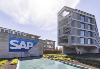 Logo and building of the listed software company SAP, headquarters. Walldorf, Baden-Württemberg,